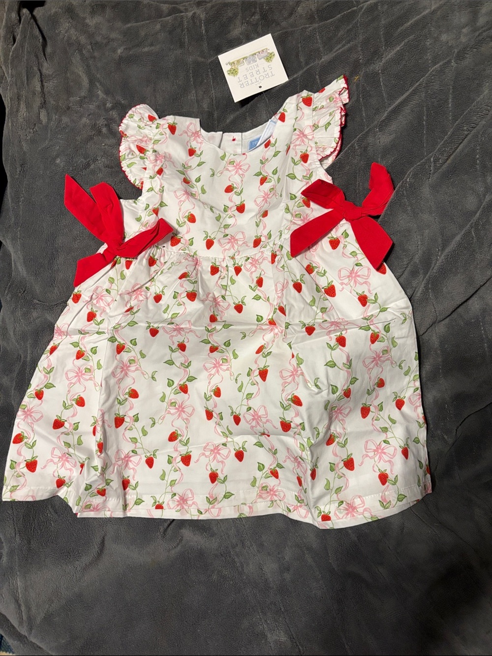 Trotters Strawberry Print Dress with Pink Ribbon Accents